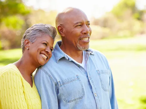 Couple outside Smiling